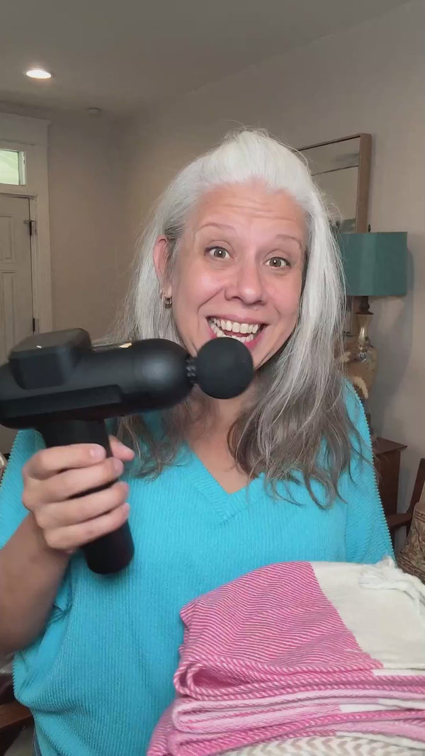 massage gun and turkish towels